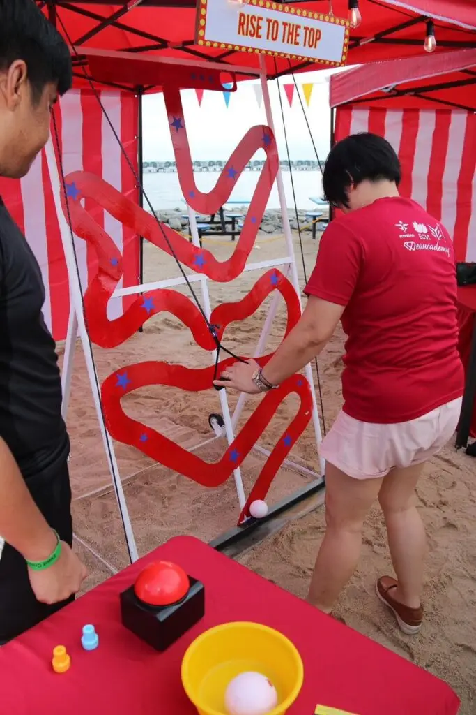 Rise to the Top Challenge - Participants face a thrilling test of skill and coordination as they navigate a challenging course. Ideal for friendly competition, this interactive attraction adds challenge and achievement to events and parties.