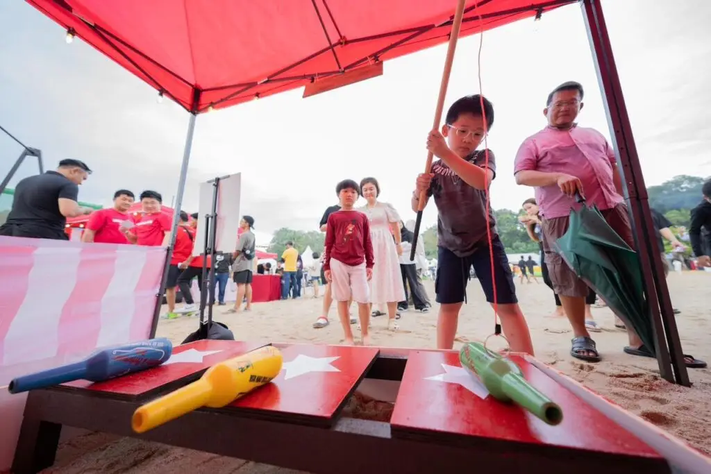 Bottoms Up Challenge - Participants engage in a hilarious bottle-flipping challenge, showcasing skill and dexterity. Ideal for all ages, this interactive game adds a lighthearted and entertaining touch to events and parties.